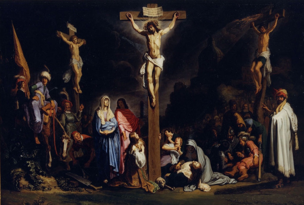 Jesus é crucificado entre dois ladrões